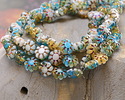 Czech Glass Sunny Coast w/ Metallic Rainbow Cactus Flower 9mm