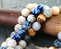 Coastal Sunset Fire Agate Faceted Round 10mm