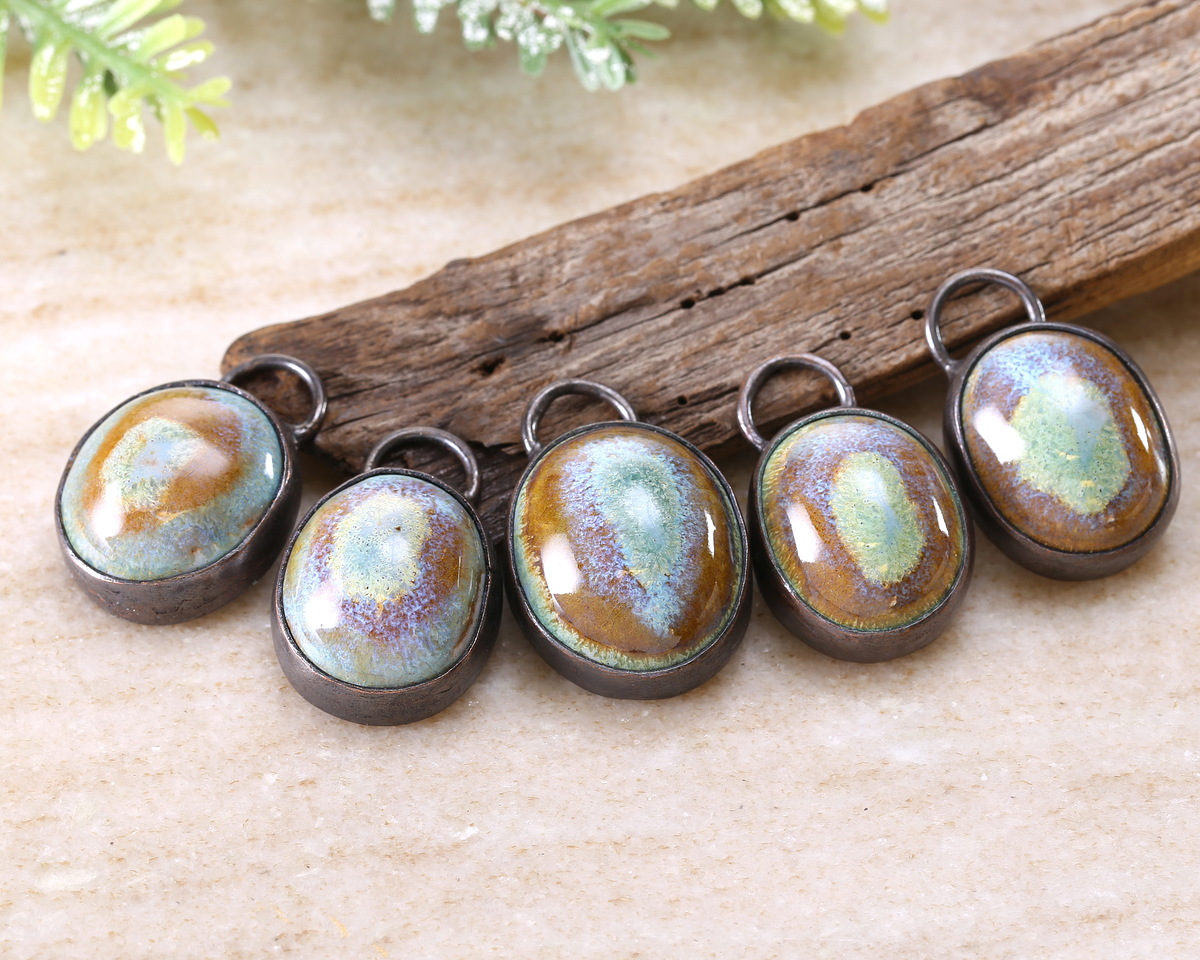 Gaea Ceramic Magical Mist Oval set in Antique Copper Bezel 28-30x18-19mm