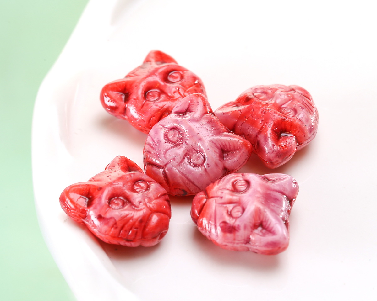 Czech Glass Cinnamom Swirl Cat Head 12mm