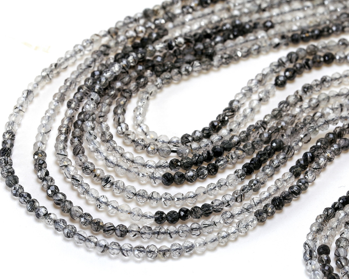 Tourmalinated Quartz (A) Ombré Micrfaceted Round 2mm