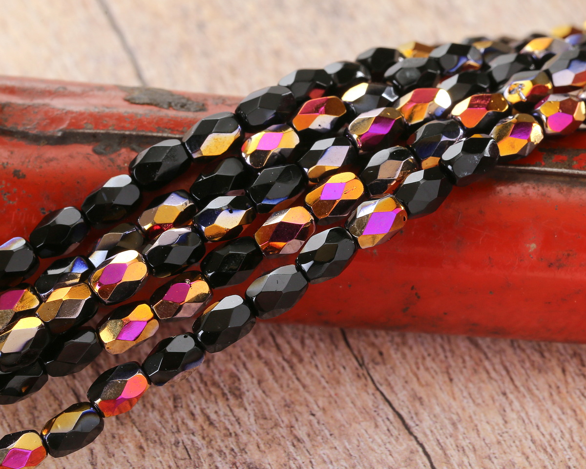 Czech Glass Jet w/ Metallic Rainbow Fire Polished Faceted Rice 7x5mm