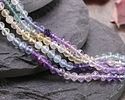 Rainbow Fluorite (AA) Ombré Microfaceted Round 4mm