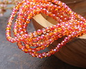 Czech Glass Glass Dual Coated Pink & Orange AB Round Druk 4mm