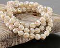 Czech Glass Ivory AB w/ Platinum Faceted Melon Round 6mm