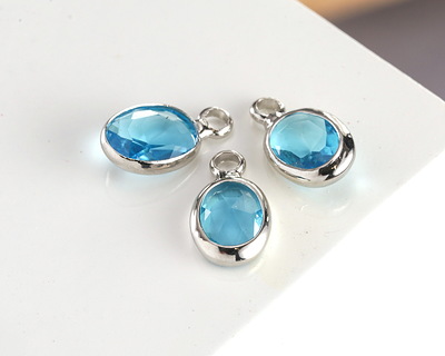Capri Crystal Oval Drop in Silver Finish Bezel 6x8mm