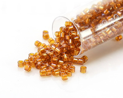 Miyuki Delica Lined Topaz AB (DBM0065) 10/0 Seed Bead