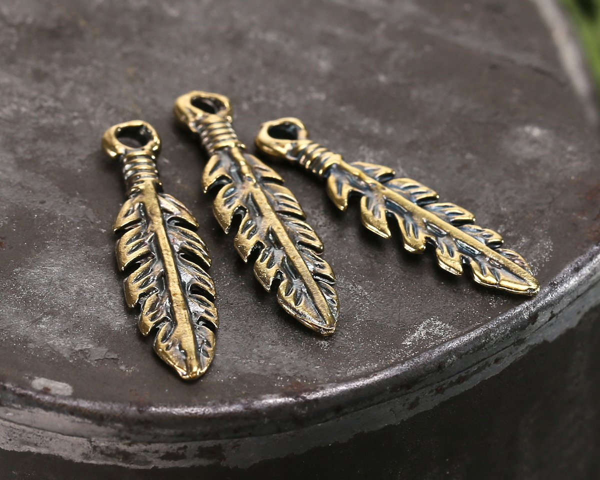 Mykonos Antique Brass (plated) Leafy Feather Charm 7x26mm