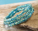 Czech Glass Aqua Blue w/ Antique Gold Trica Beads 3x4mm